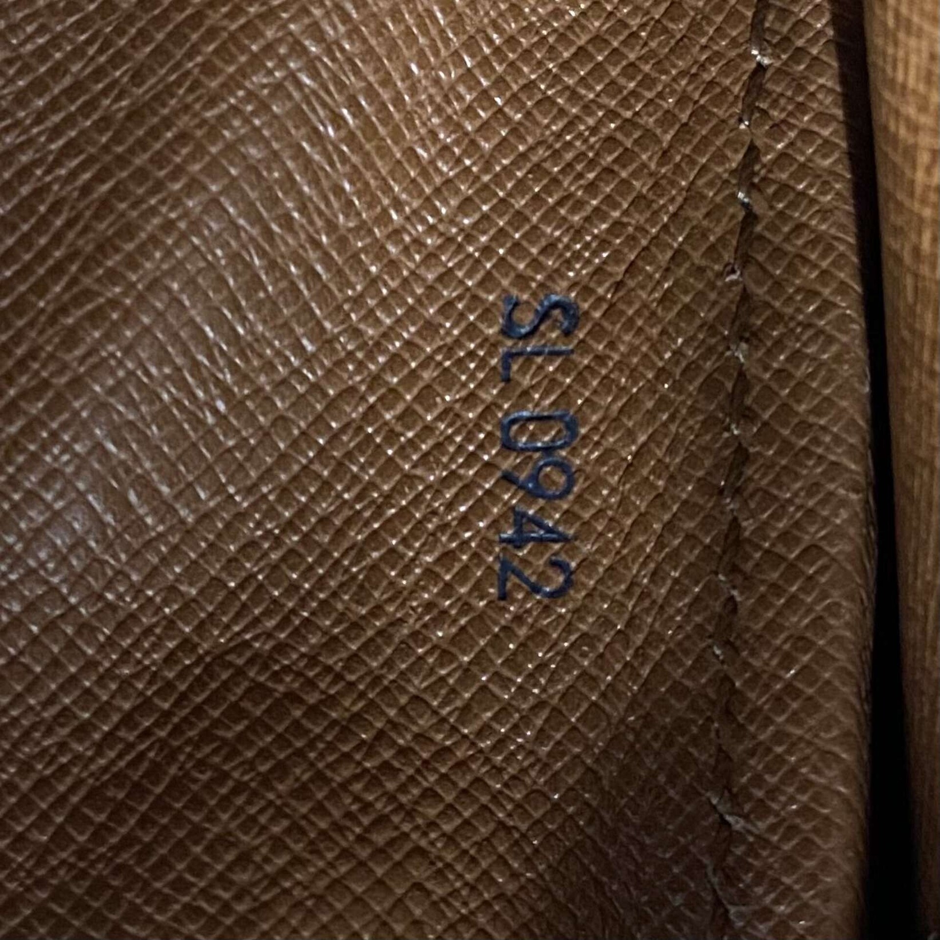 Bolsa Louis Vuitton Cartoucherie Monogram