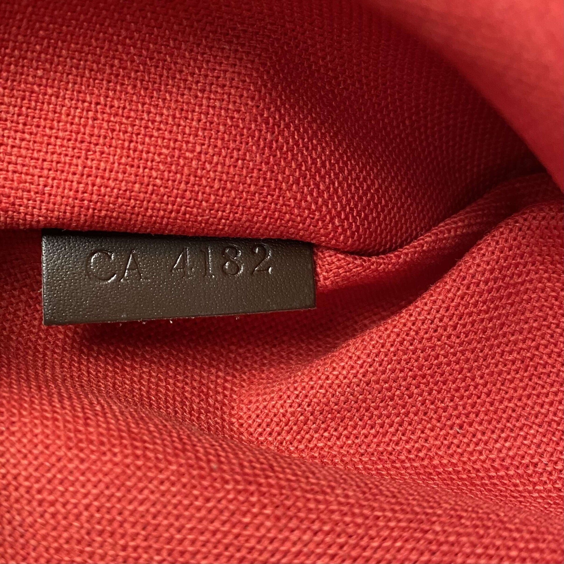 Bolsa Louis Vuitton Pochette Damier Ebene