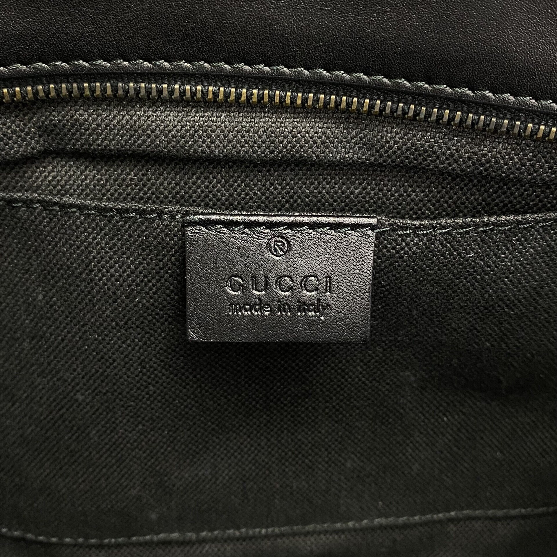 Clutch Gucci Stirrup Brocada