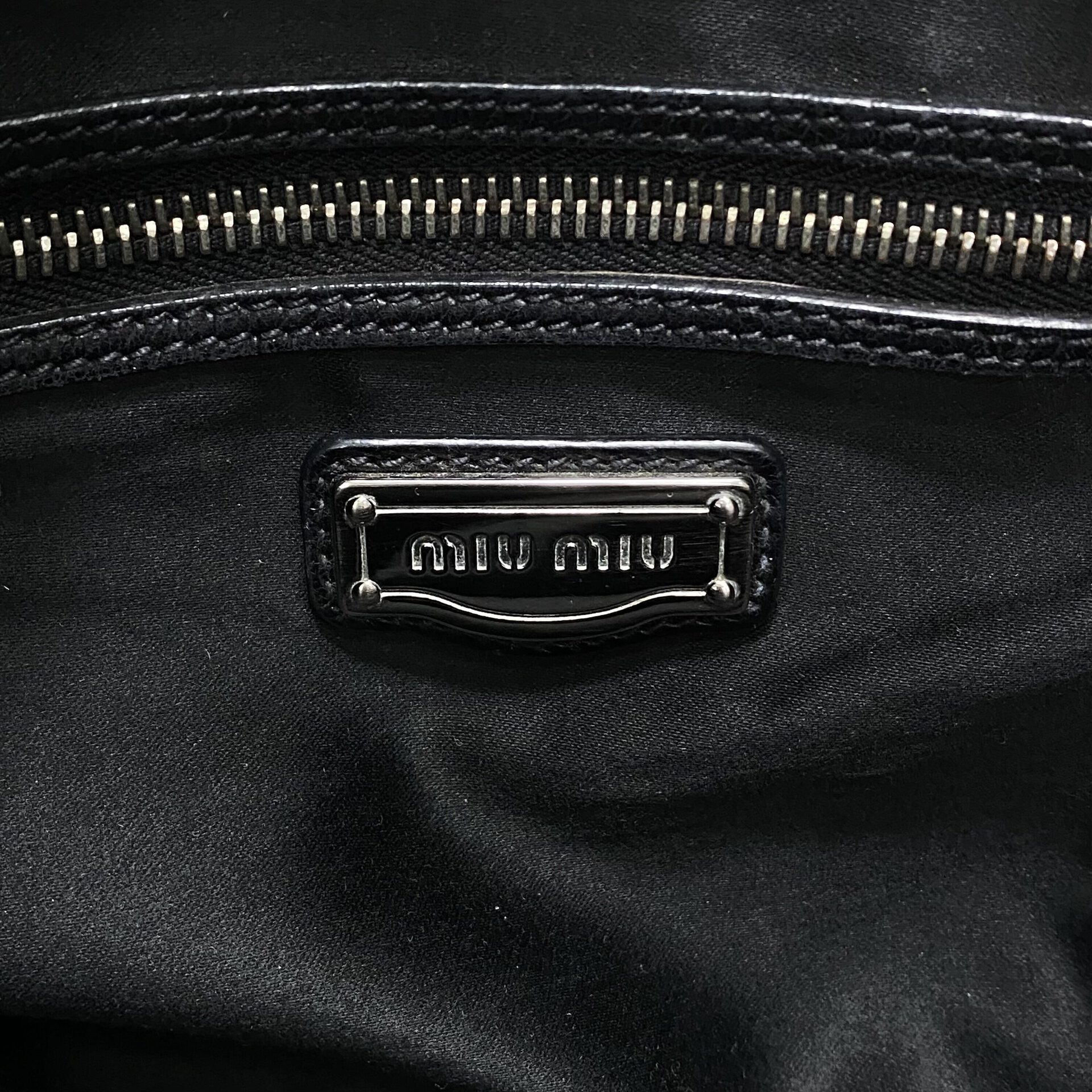 Bolsa Miu Miu Couro Listrado