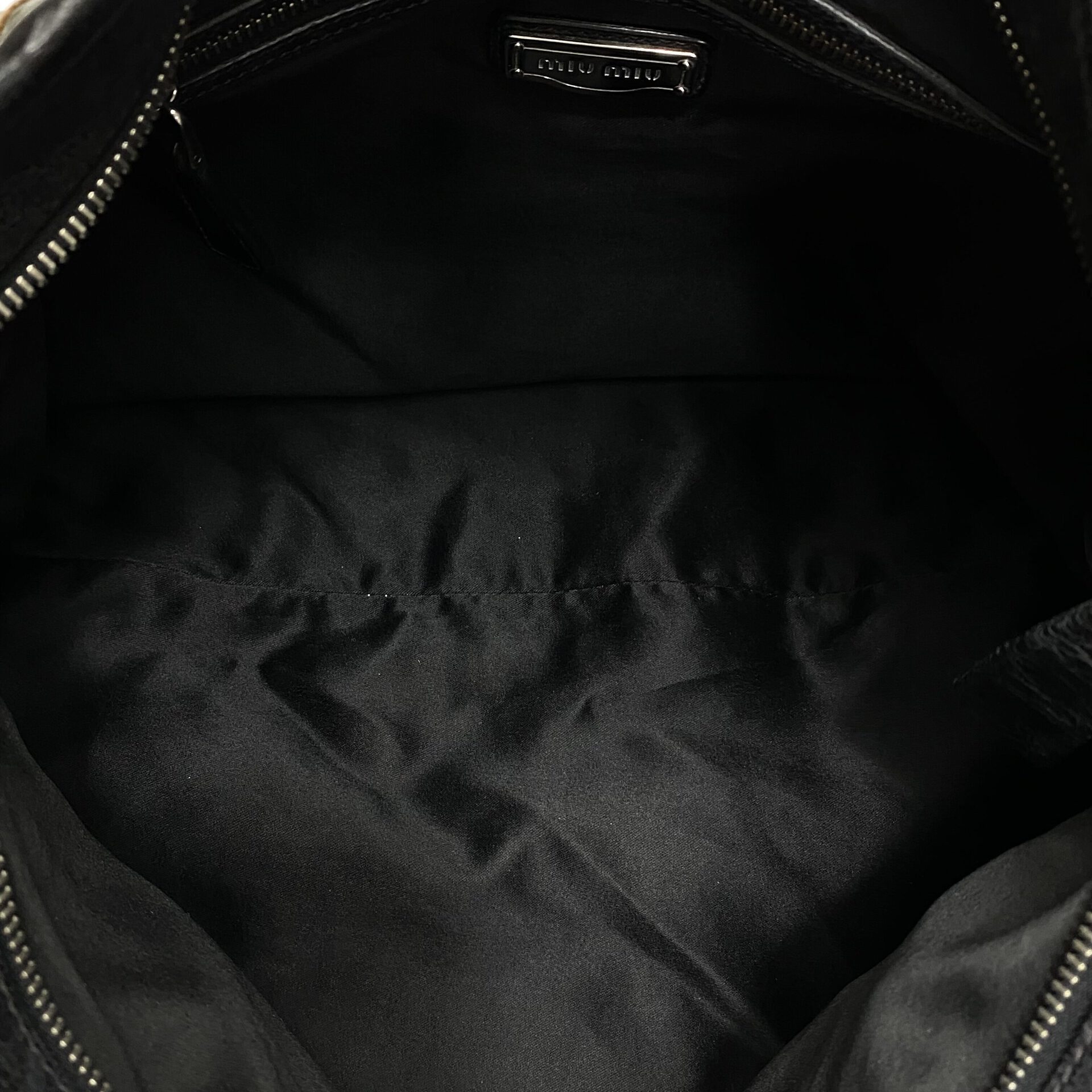 Bolsa Miu Miu Couro Listrado