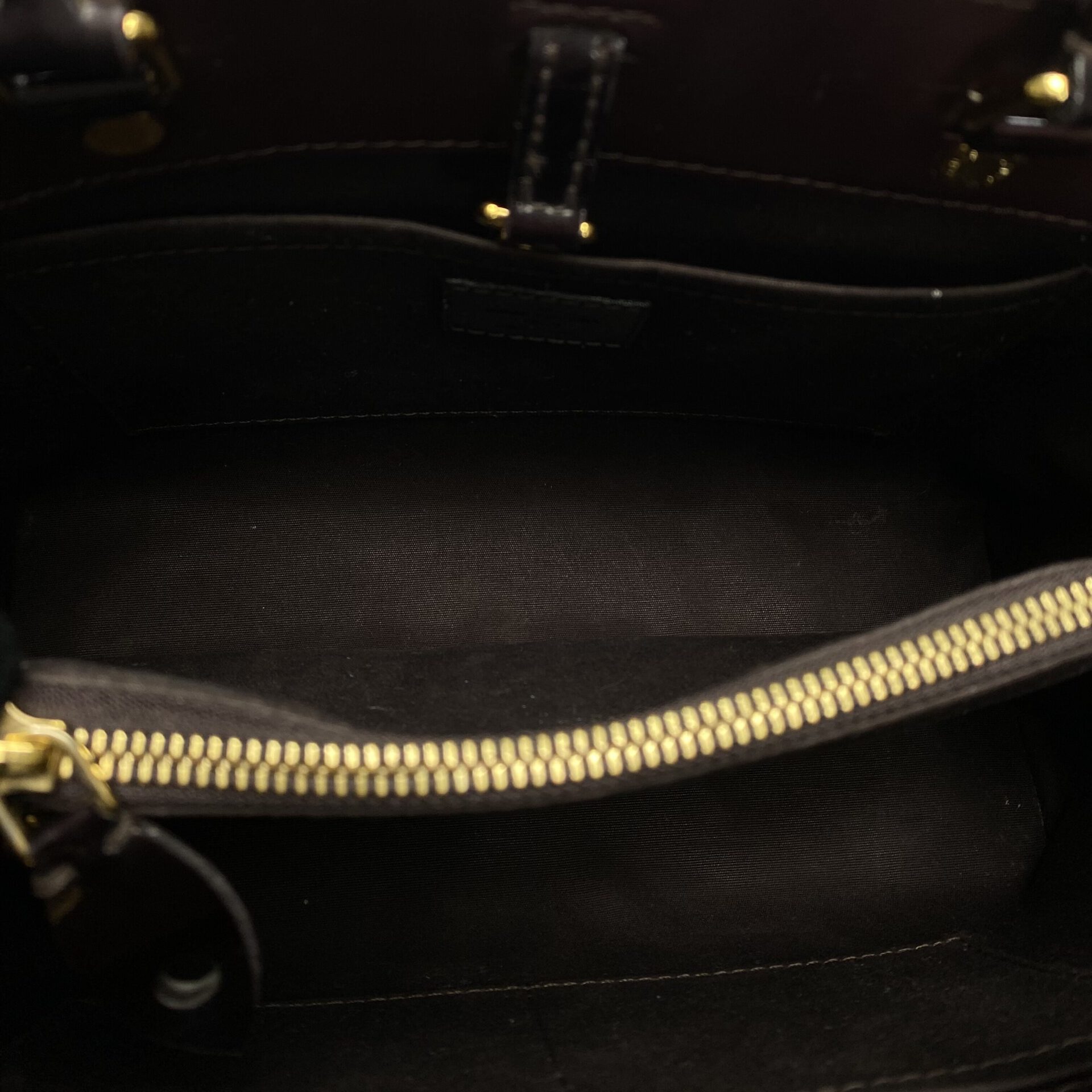 Bolsa Louis Vuitton Montaigne Verniz