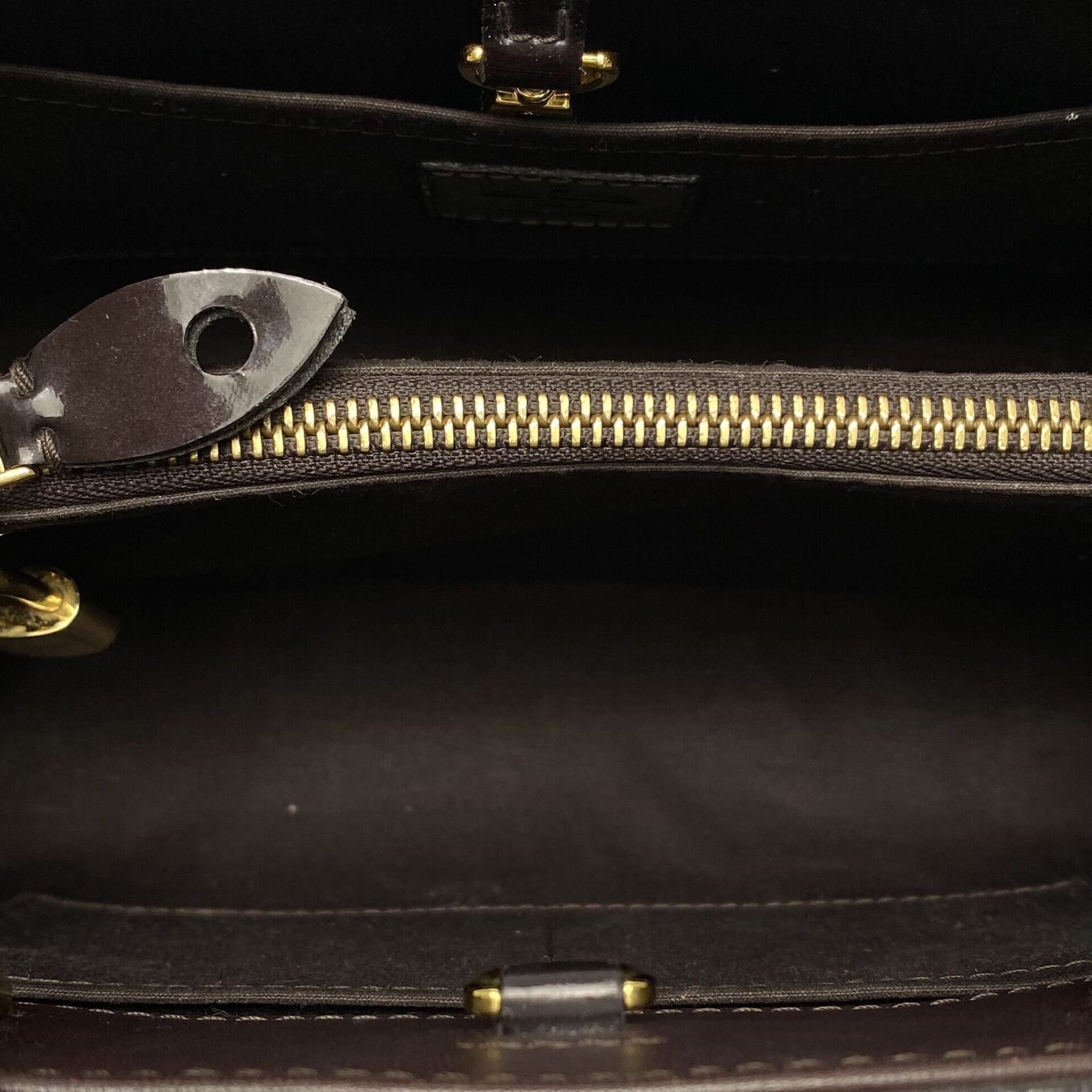 Bolsa Louis Vuitton Montaigne Verniz