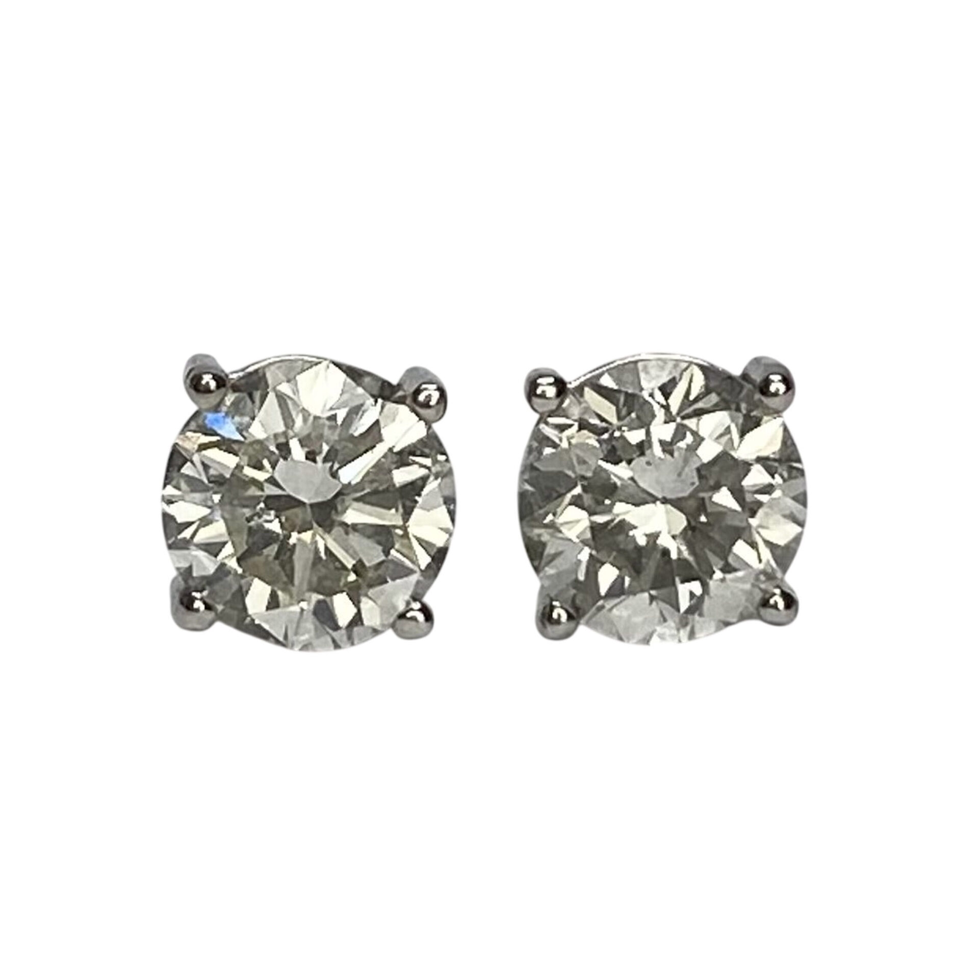 Par de Brincos Solitários - 1.04 ct.
