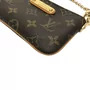 Bolsa Louis Vuitton Pochette Milla PM Monogram